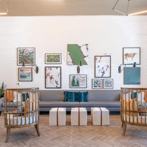 Take advantage of all The Chloe Leander has to offer a room with a table and chairs